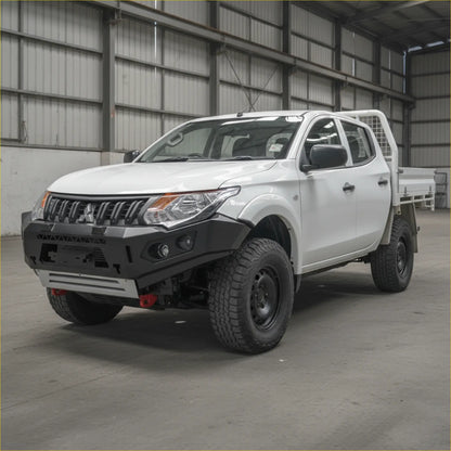 White mitsubishi mq triton pickup with black rockarmor gt steel hoopless bullbar and rugged off-road tires