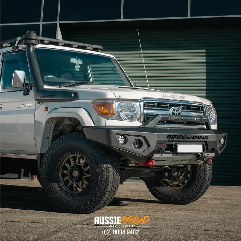 White Toyota Land Cruiser with Rockarmor GT Steel Hoopless Bullbar and aftermarket bumper