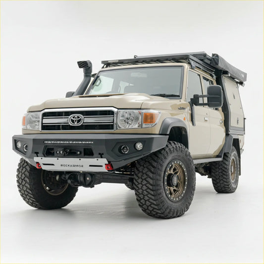 Beige toyota land cruiser with black rockarmor gt steel hoopless bullbar front bumper and roof rack