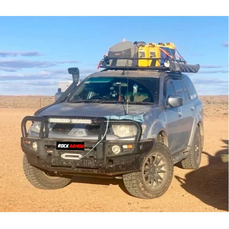 Gray SUV with roof rack featuring Steel Bullbar and Fog Lights for Mitsubishi Triton