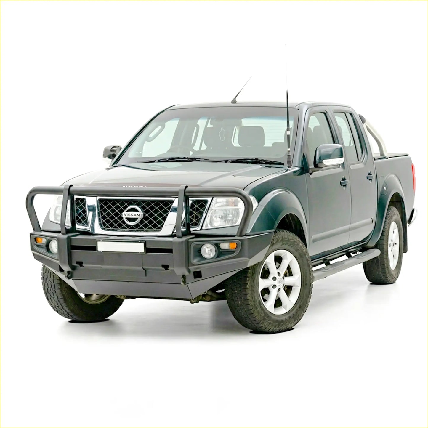 Dark green nissan navara with rockarmor premium steel bullbar featuring black front bumper guard and chrome accents