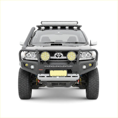 Black toyota hilux n70 pickup with rockarmor premium steel bullbar heavy-duty bumper led light bar and off-road lights