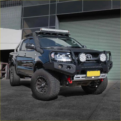 Black Toyota Hilux with Rockarmor premium steel bullbar and heavy-duty bumper for rugged off-road use