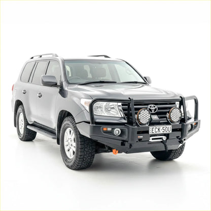 Silver toyota land cruiser with rockarmor premium steel black bullbar and auxiliary lights on the front