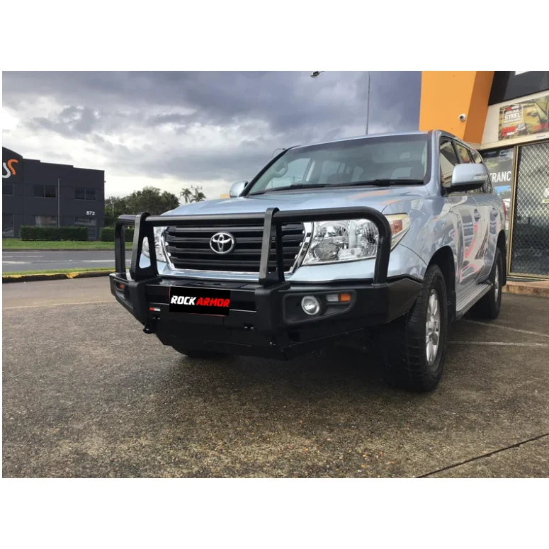 Silver Toyota Land Cruiser with black premium steel bullbar and fog lights for protection