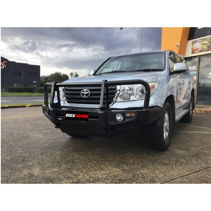Silver Toyota Land Cruiser with black premium steel bullbar and fog lights for protection