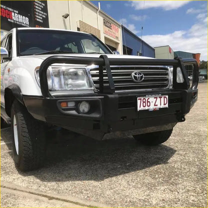 White toyota land cruiser with black steel rockarmor premium bullbar and chrome grille for fj100 ifs model