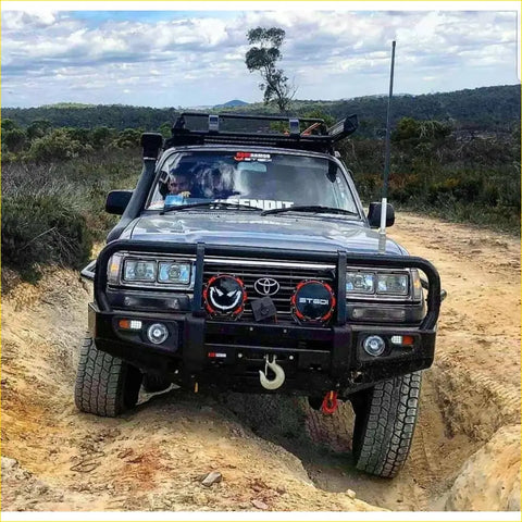Black toyota land cruiser with rockarmor premium steel bullbar full bar replacement perfect for 4wd offroad use