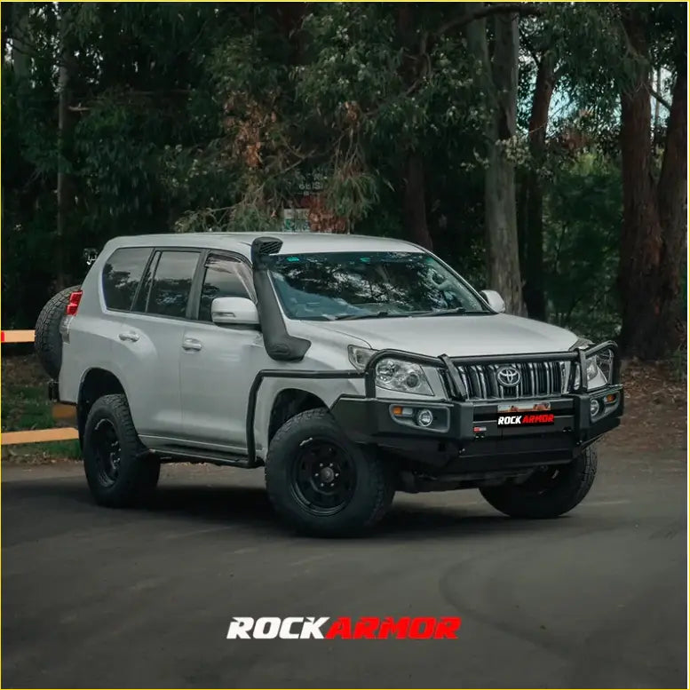 Silver toyota land cruiser prado fj150 with black rockarmor premium steel bullbar for tough 4wd offroad use