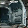 Rear view of black rockarmor rockarmor rear folding table and pantry cargo rack mounted inside a silver prado 120 suv