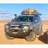 Dark gray mitsubishi triton challenger with black premium bullbar and roof rack carrying yellow gear from rockarmor rock pack