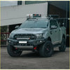 Silver ford ranger with black off-road tires and rugged front bumper featuring gt hoopless bullbar rock sliders