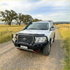 Silver toyota land cruiser with black gt hoop bullbar front bumper and roof rack from rockarmor rock pack 07-15+