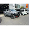 Silver toyota hilux 2020 with black off-road rockarmor rock pack featuring gt hoop bullbar and rock sliders side view