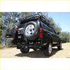 Back view of black steel rockarmor dual wheel carrier rear bumper with spare tire mount and roof rack for 4wd offroad ute