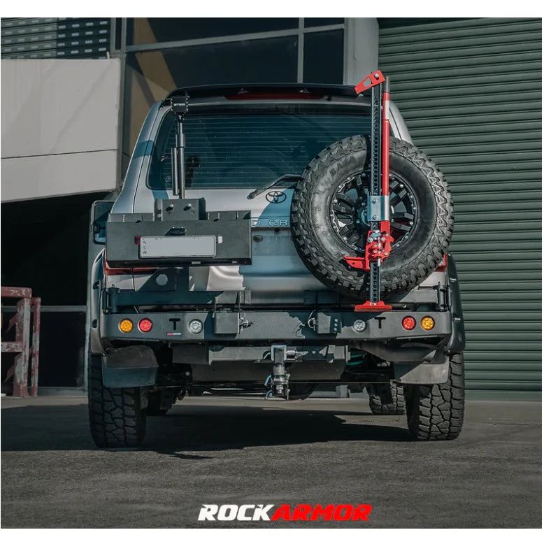 Silver SUV with rear-mounted spare wheel carrier and jack for Toyota Landcruiser Fj100 Gen III