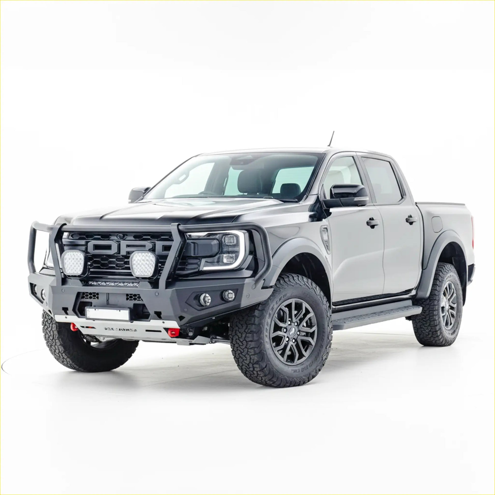 Gray ford raptor with black rockarmor steel gt hoop bull bar and rugged off-road tires for ranger raptor 2023+