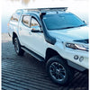 White Mitsubishi Triton with snorkel and roof rack featuring rockarmor steel rockslider checker plate side steps rear view