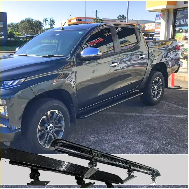 Black metal rockarmor steel rockslider side steps with diamond plate texture and chrome accents for mitsubishi triton mv