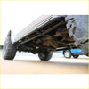 Black steel rockarmor tubular underbody guard mounted under white nissan patrol y62 4wd ute for offroad protection