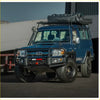 Deep blue toyota land cruiser 76 series with black rockarmor steel rockslider side steps perfect for offroad 4wd ute use