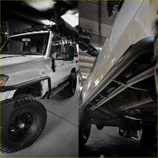 White toyota land cruiser 70 with black rockarmor steel rockslider side steps and rugged off-road tires shown from back side