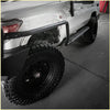 Black tubular steel front bumper guard on white toyota landcruiser 76 series 4wd offroad ute