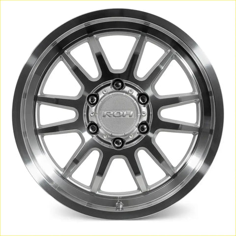 A sleek roh arc 17x9 silver alloy wheel with a polished silver center and black outer rim 6x139.7 12 offset