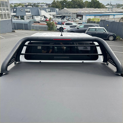 Black metal roll bar sport bar rack with textured gray tonneau cover shown from the back for gwm cannon 2019-current