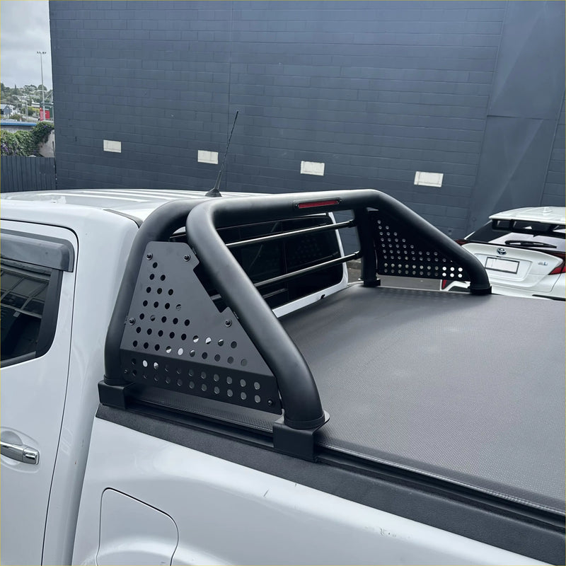 Black perforated metal roll bar with curved bars and side panels for toyota hilux 2021-2025 truck bed rail back view