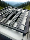 Black metal heavy duty roof rack with grid design mounted on the back of a white ford ranger 2022+
