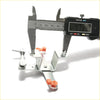 Silver metal clamp with orange knobs measured by digital caliper for rr gate door handle mitsubishi triton l200 1996-2006