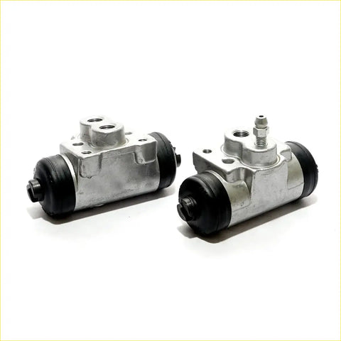 Silver metal rr wheel brake cylinder with black rubber seals and threaded fittings for mitsubishi pajero 2008-2015
