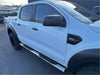 White ford ranger with black accents and chrome 4 inch oval stainless steel running board on double cab side