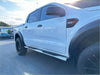 White ford ranger double cab with black accents and chrome 4 inch oval stainless steel running board side steps