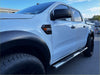 White ford ranger double cab with black fender flares and 4 inch oval stainless steel running boards side view