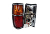 Nissan Datsun 720 2 x Tail Light Lamps Chrome Black Trim (1982-1984)