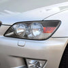 Lexus IS200 IS300 Carbon Fiber Headlight Eyelid Eyebrow Cover (1998–2005)