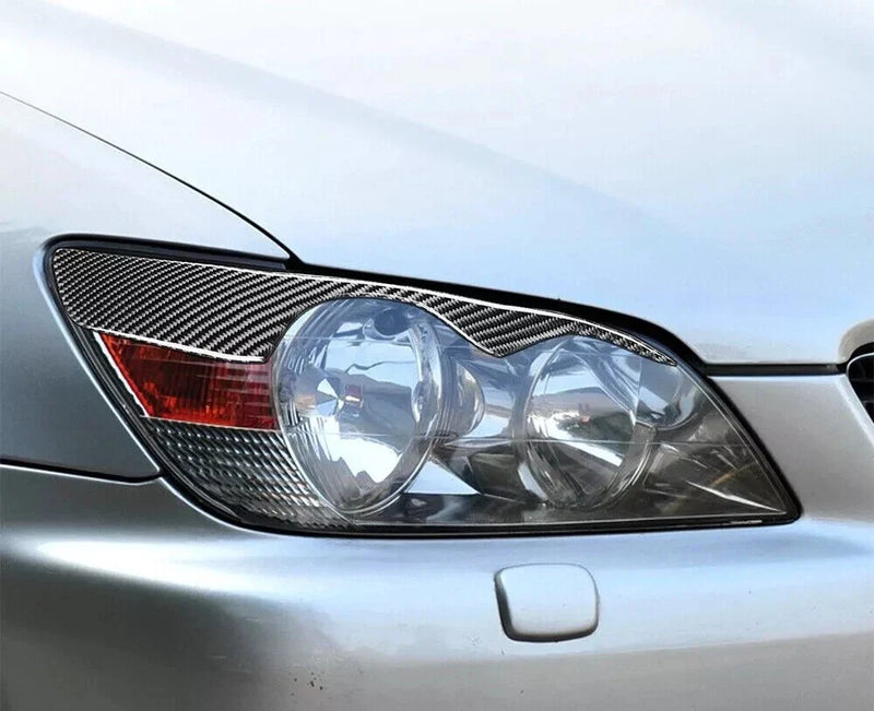 Lexus IS200 IS300 Carbon Fiber Headlight Eyelid Eyebrow Cover (1998–2005)