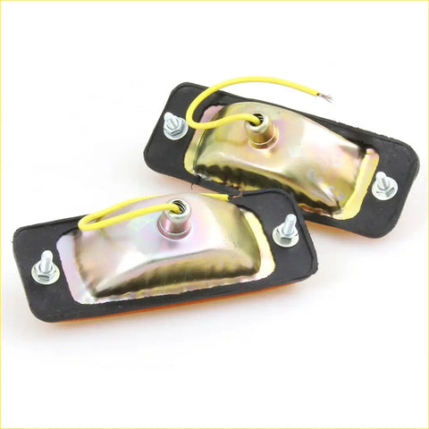 Rectangular amber led side marker lights with black rubber bases and metallic reflective surfaces for mazda b1600 1971-1979