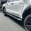Black metallic srs cruiser side step running board mounted on white toyota hilux double cab 2015-2026 model