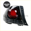Smoked tail lights for Toyota Altezza RS200 black plastic assembly with clear lens and red illuminated circular bulb