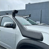 Black rubber snorkel tube mounted on the front of a white holden colorado 2012-2020 pickup truck