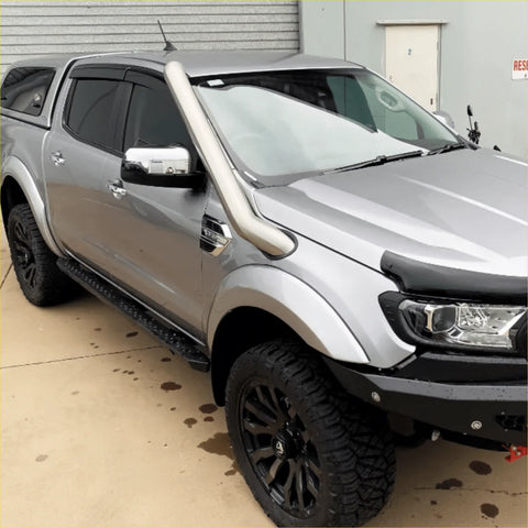 Silver ford ranger pickup with black wheels and chrome bull bar featuring stainless steel snorkel for px1 px2 px3 2012-2021
