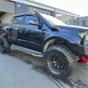 Black stainless steel snorkel on a black ford ranger px2 px3 2016-2021 with rugged off-road tires