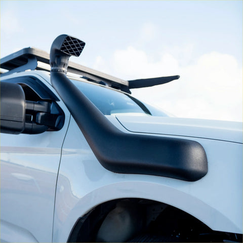 Black rubber snorkel tube with mesh grille mounted on white isuzu d-max 2021-2023 vehicle