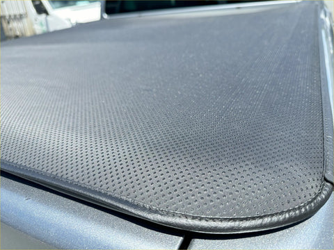 Gray perforated soft tonneau cover with stitched edges for isuzu d-max 2012-current double cab truck bed