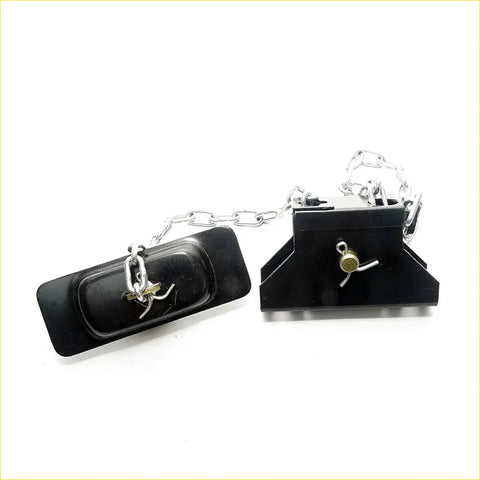 Black plastic livestock leg trap with silver metal chain and adjustment mechanism for mazda b series spare tire carrier back side