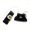 Black plastic door stop with silver chain and brass metal parts for spare tire carrier hanger on nissan navara datsun d21 king cab