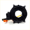 Black plastic airbag tensioner assembly with orange and yellow connectors for spiral cable clock spring mitsubishi outlander